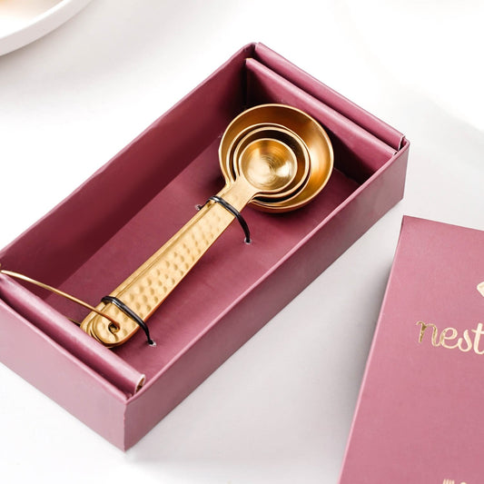 Set Of 4 Gold Measuring Spoons